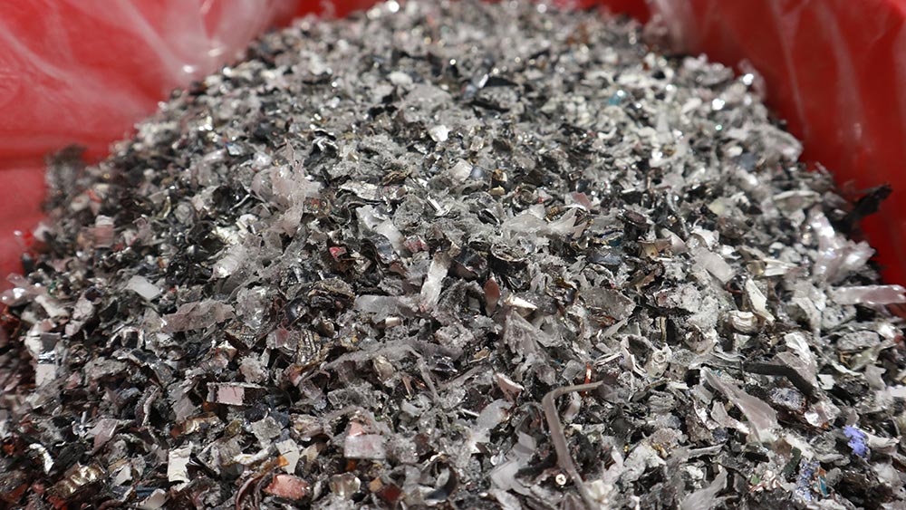 The shredded pieces of smartphones that will be sent for rare metal extraction.