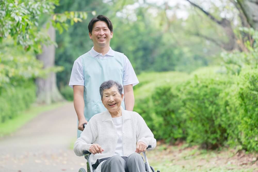 an older person and a carer