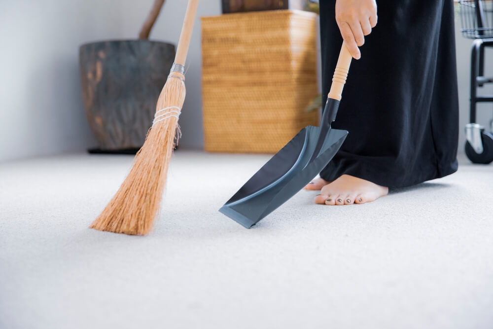 Sweeping with a broom